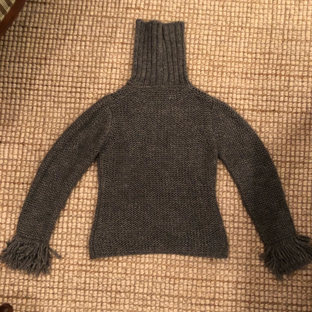 Gray poly/wool sweater with fringed cuffs.  Size 8